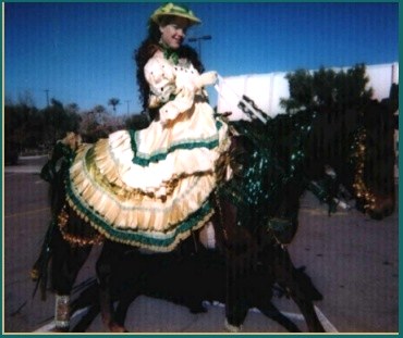 Kim at Fiesta Bowl Parade riding StarDancer